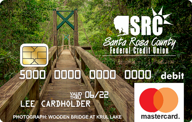 debit card with photo of bridge in a green forest